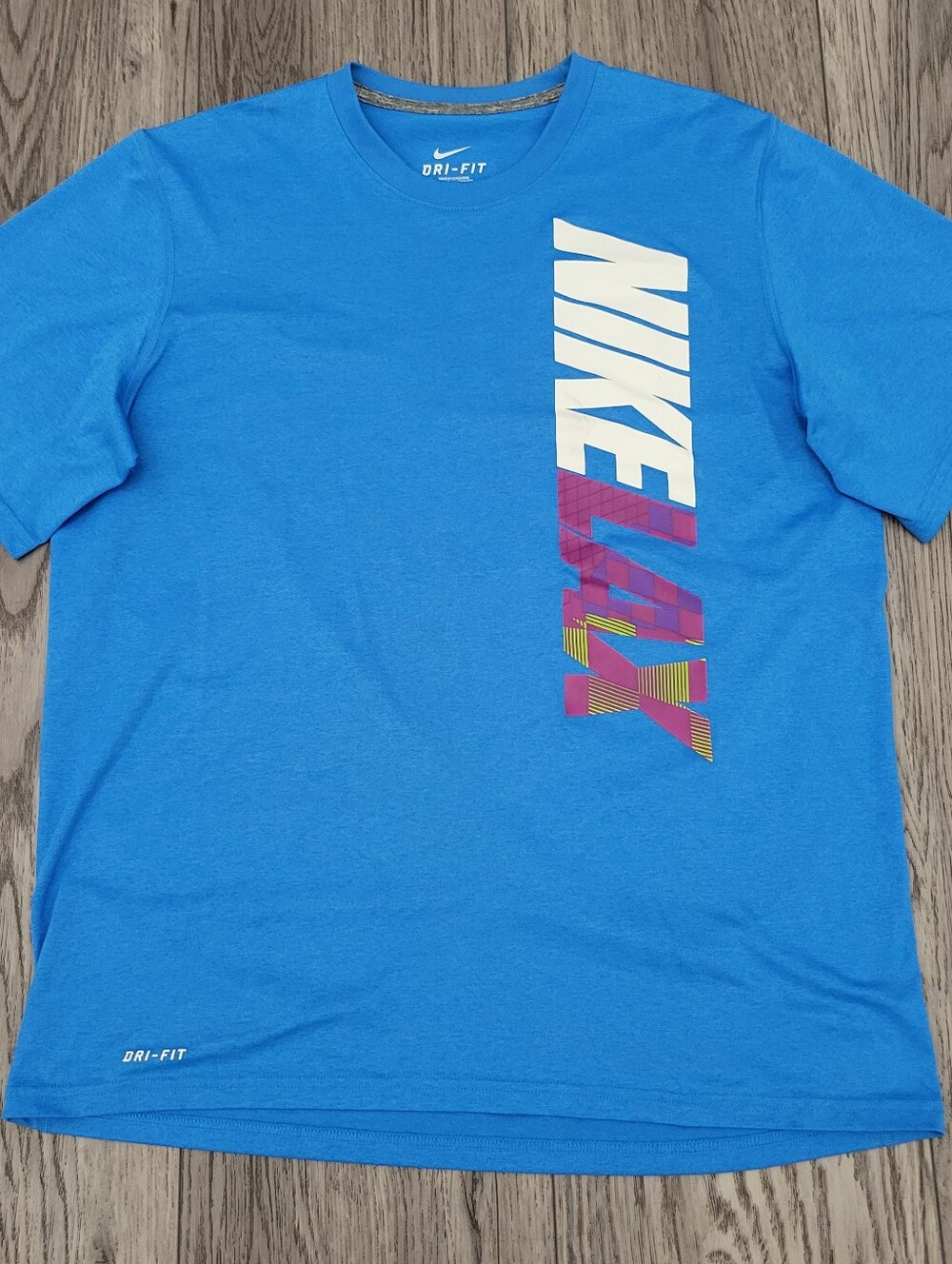 Nike Blue Vertical Logo Tee with White & Purple Accent